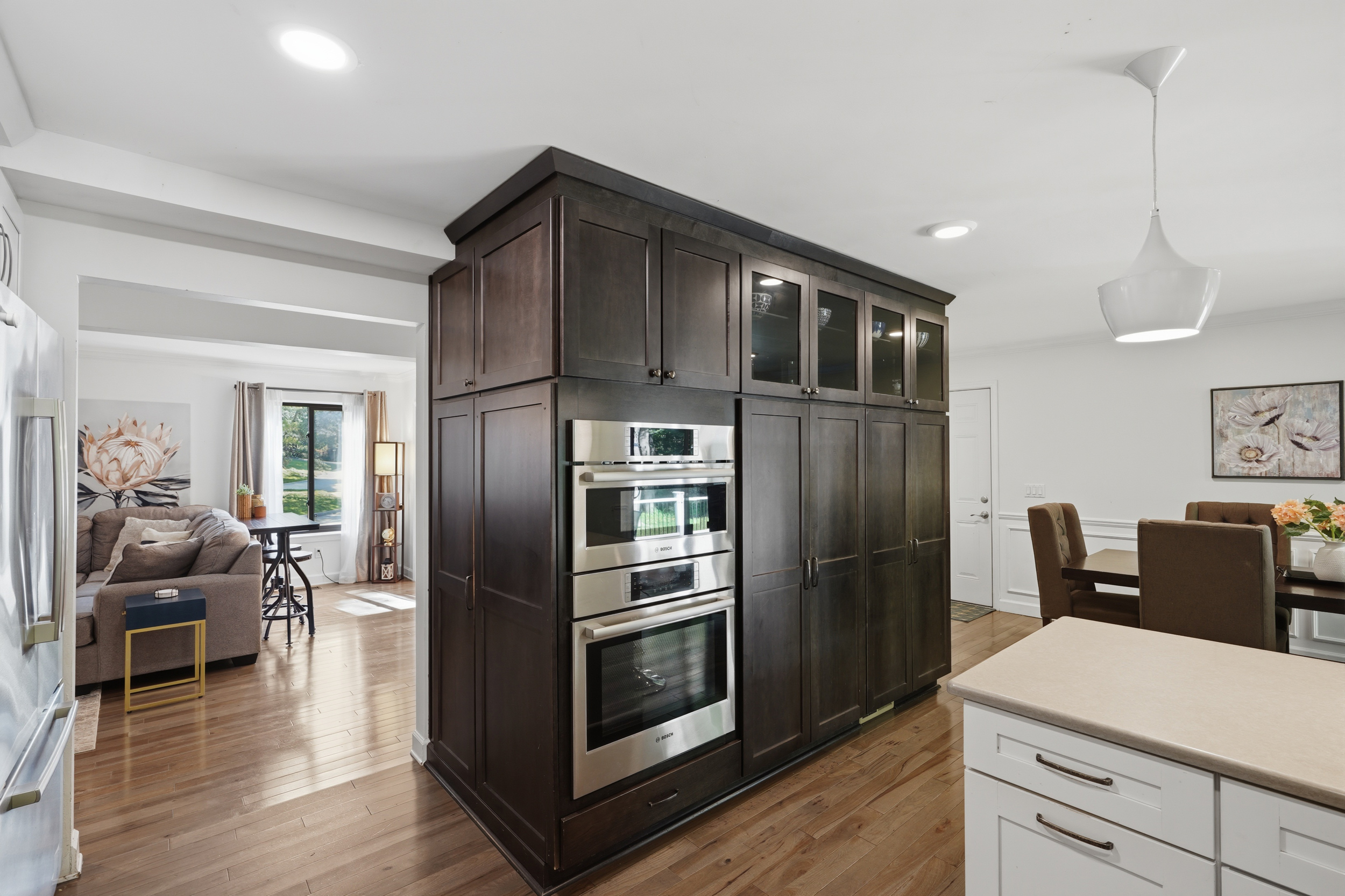 Floor-to-ceiling kitchen storage with built-in appliances