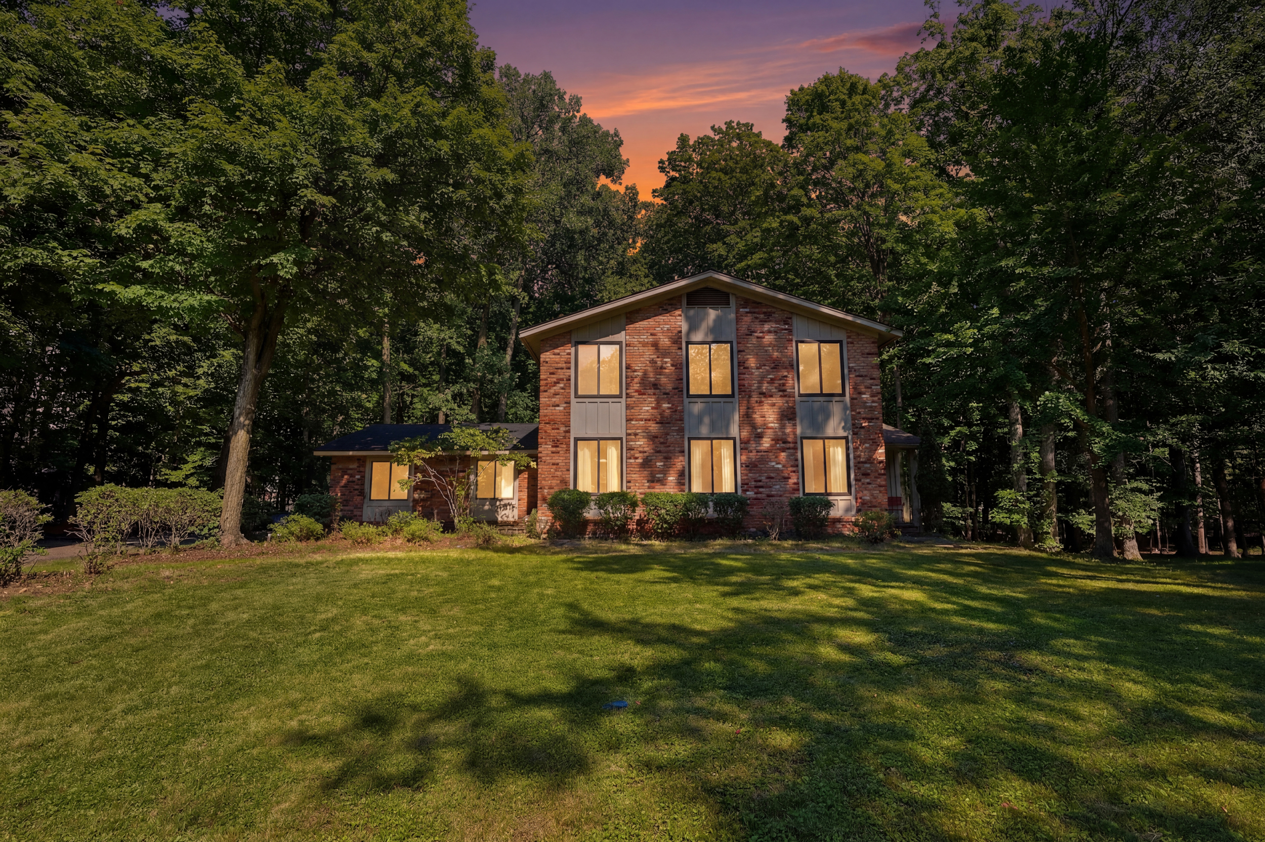 Front exterior illuminated at dusk